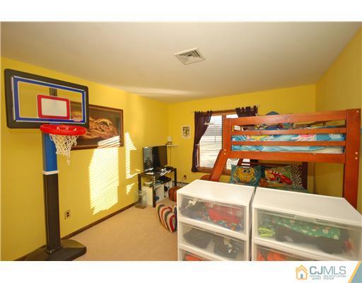 196 Friendship Road Cranbury, NJ 08512 - Photo 13 of 25 a bed room with a bed