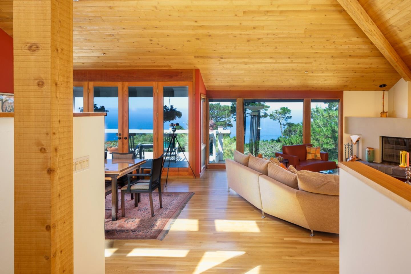 211 Crest Road Carmel, CA 93923 - Photo 17 of 21 a living room with fireplace furniture and a floor to ceiling window