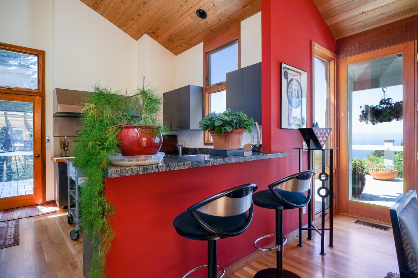 211 Crest Road Carmel, CA 93923 - Photo 9 of 21 a dining room with furniture and wooden floor