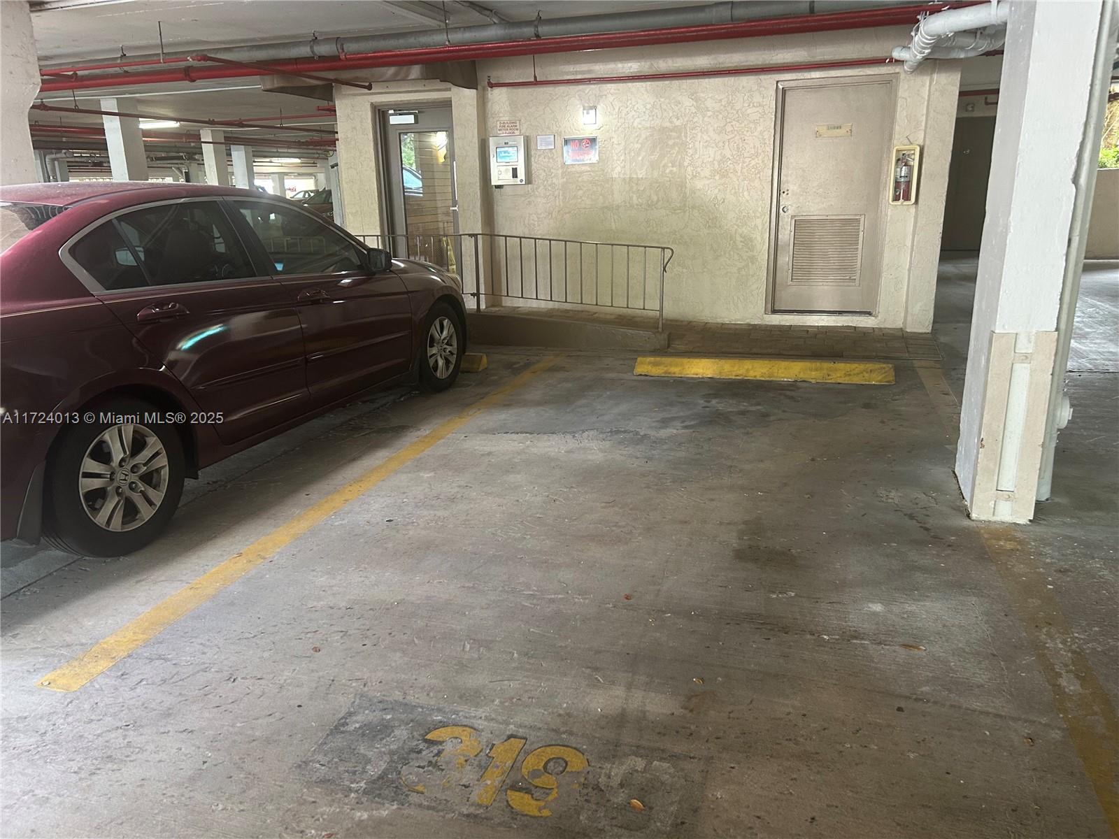 2802 North 46th Avenue, Unit B319 Hollywood, FL 33021 - Photo 37 of 40 a car parked in front of a building