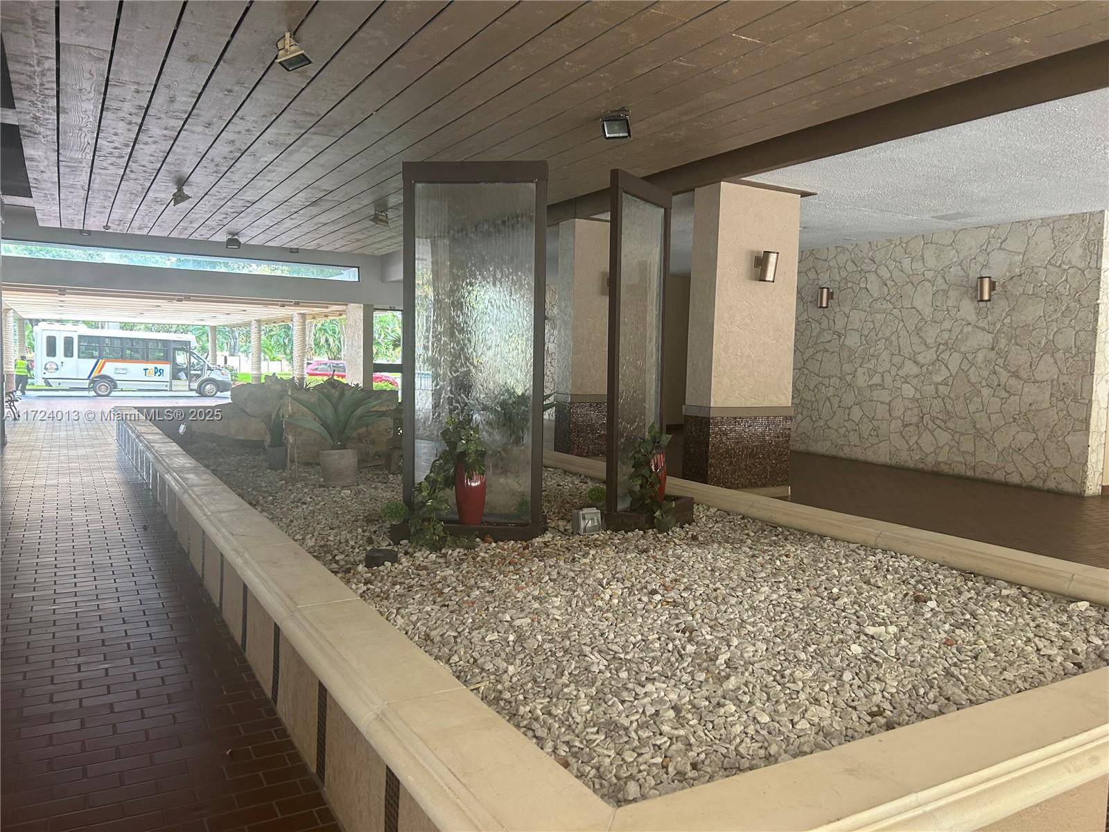 2802 North 46th Avenue, Unit B319 Hollywood, FL 33021 - Photo 38 of 40 a view of a bathroom with a sink and mirror