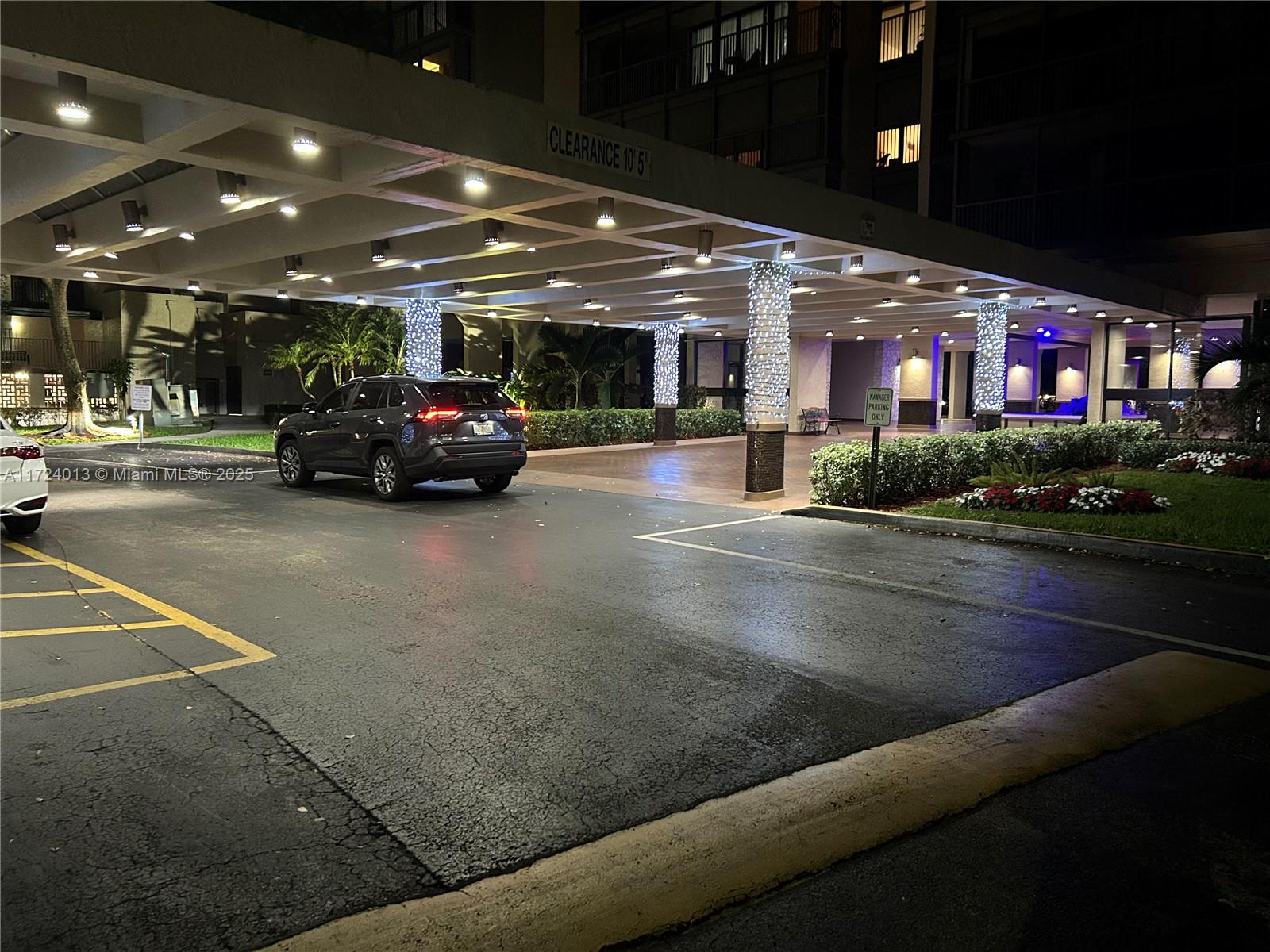 2802 North 46th Avenue, Unit B319 Hollywood, FL 33021 - Photo 39 of 40 a view of a parking area