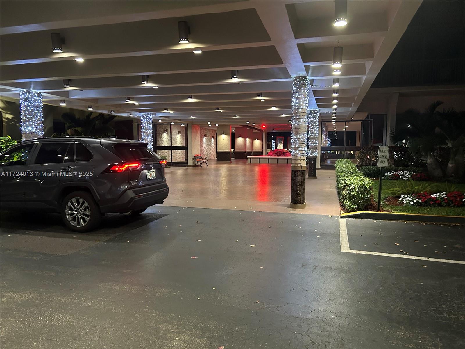 2802 North 46th Avenue, Unit B319 Hollywood, FL 33021 - Photo 40 of 40 a car that is parked in a parking space