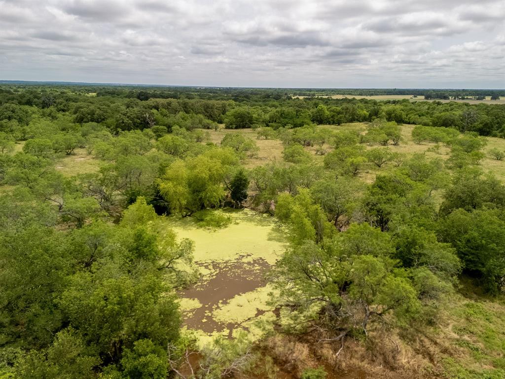 159 Riesel Tx 76682 Riesel, TX 76682 - Photo 31 of 34 a view of a yard with an outdoor space
