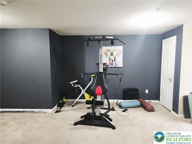 a room with furniture and air hockey table