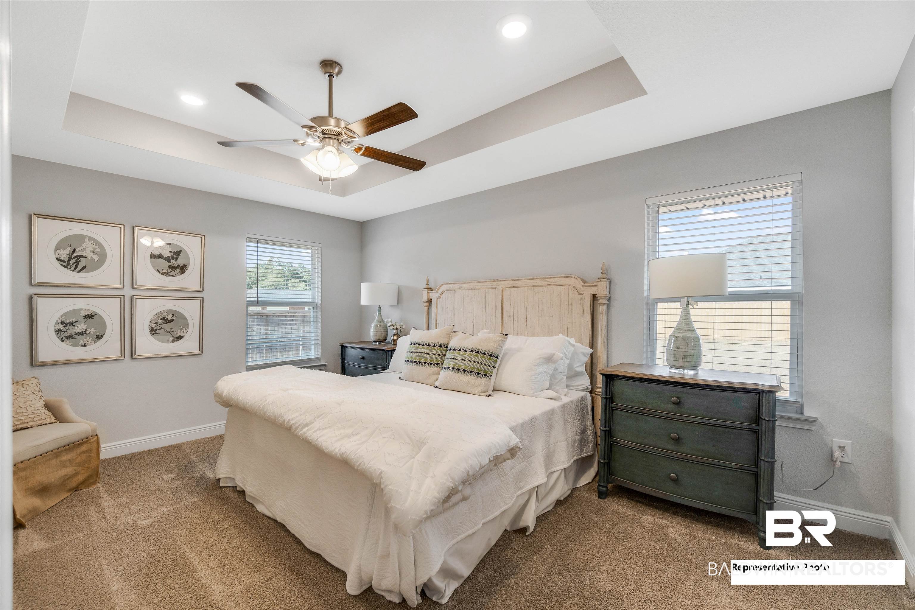 643 Mayflower Drive Foley, AL 36535 - Photo 27 of 34 Bedroom featuring carpet flooring, a raised ceiling, a ceiling fan, and baseboards