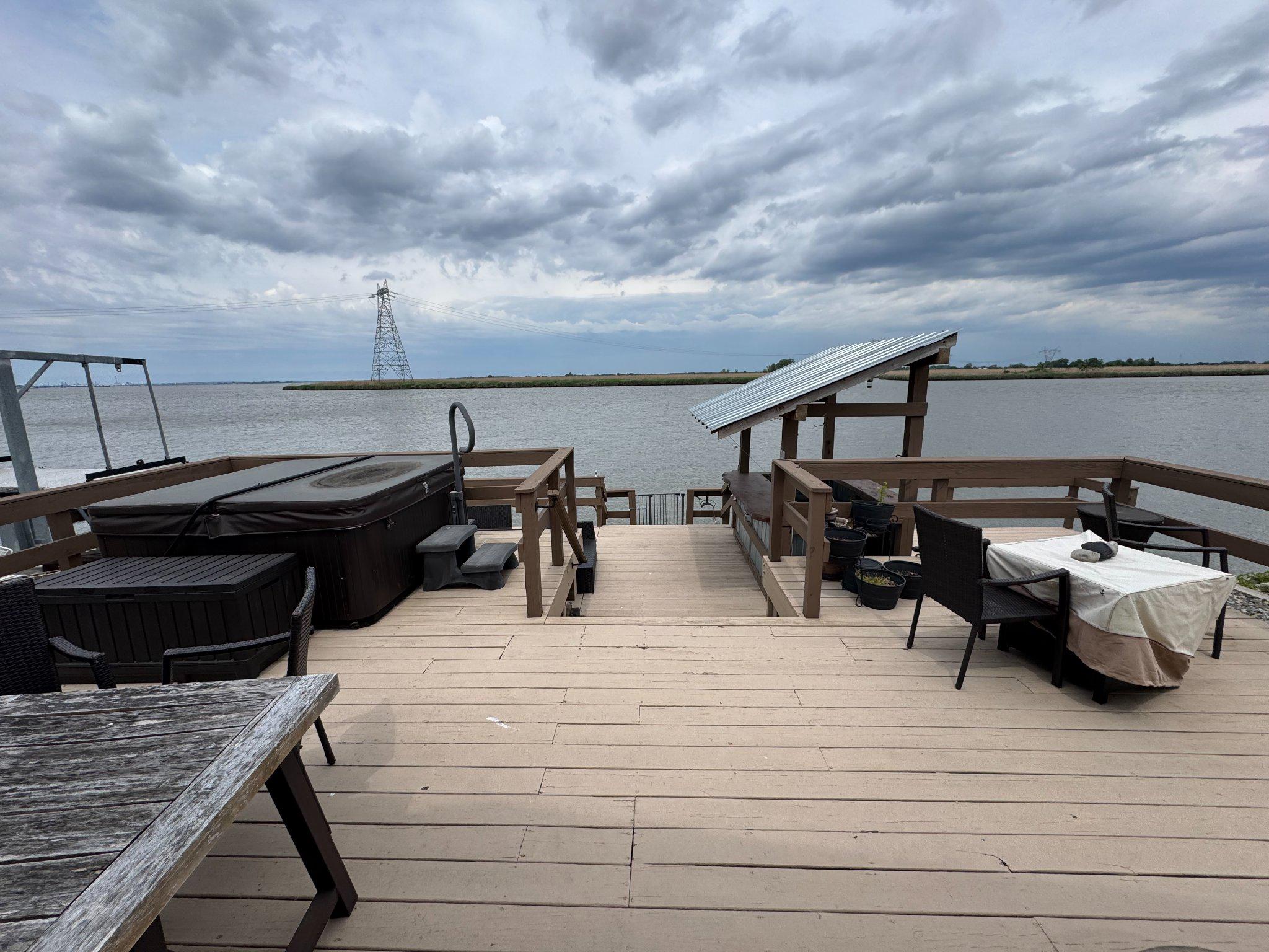 74 Sinnickson Landing Road Salem, NJ 08079 - Photo 1 of 51 a view of a terrace with furniture