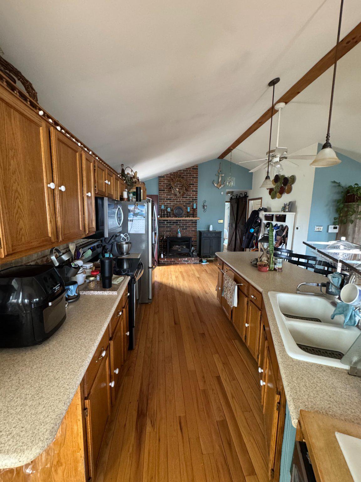74 Sinnickson Landing Road Salem, NJ 08079 - Photo 14 of 51 a kitchen with sink refrigerator and stove
