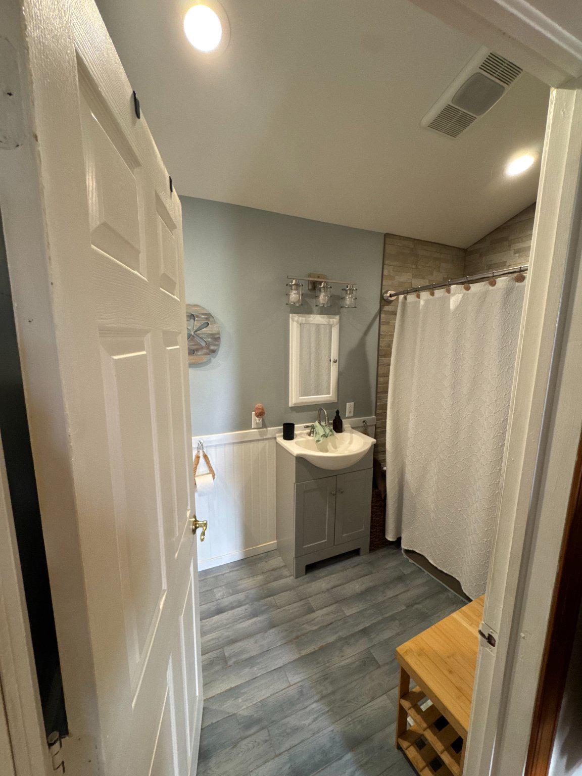 74 Sinnickson Landing Road Salem, NJ 08079 - Photo 18 of 51 a room with a sink and wooden floor
