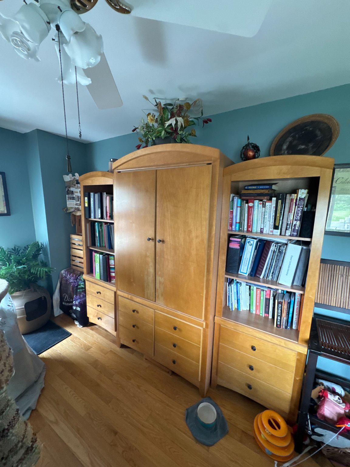 74 Sinnickson Landing Road Salem, NJ 08079 - Photo 22 of 51 a room with lots of white furniture a rug and a book shelf