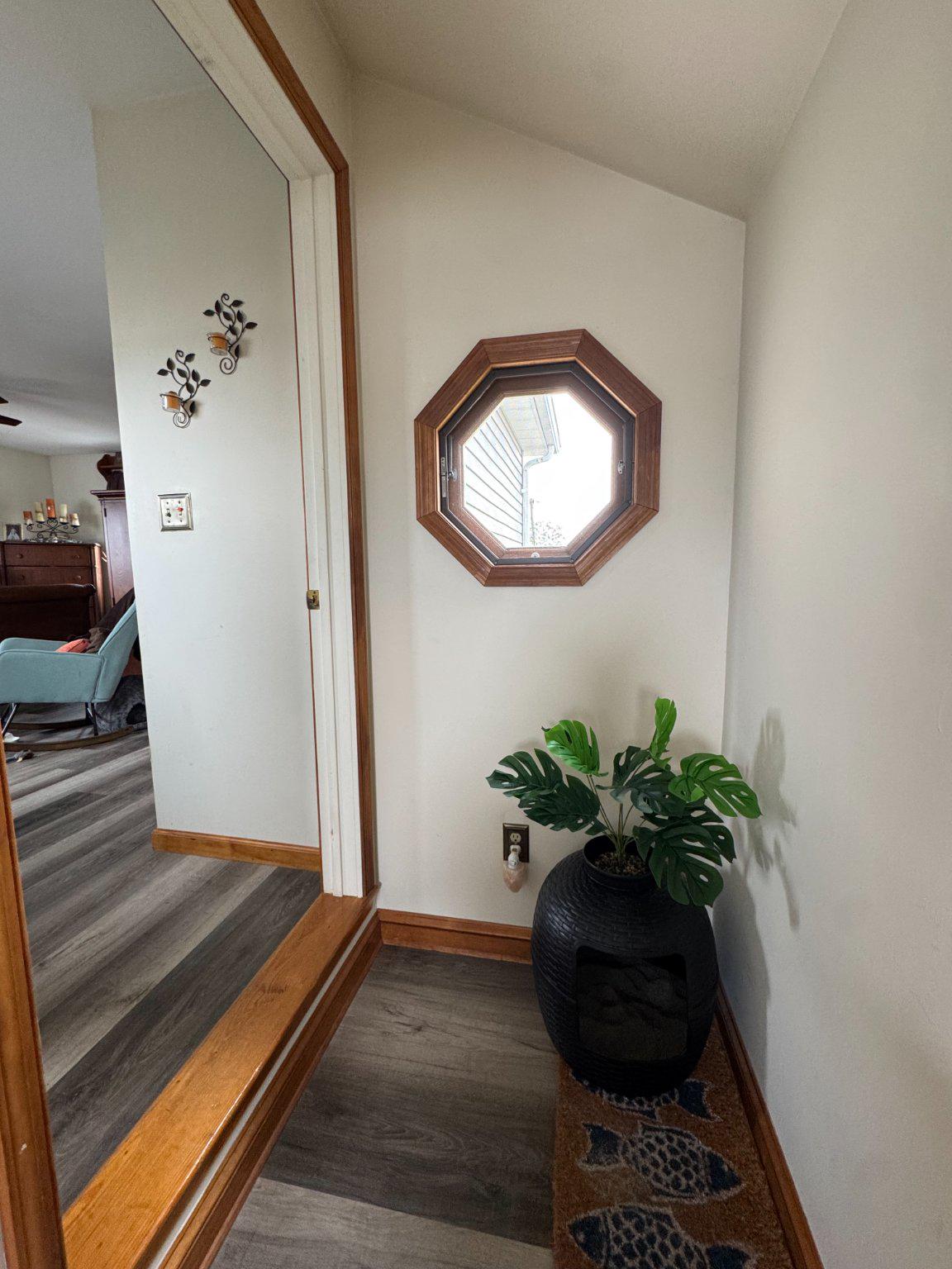 74 Sinnickson Landing Road Salem, NJ 08079 - Photo 25 of 51 a view of a hallway with wooden floor and a potted plant