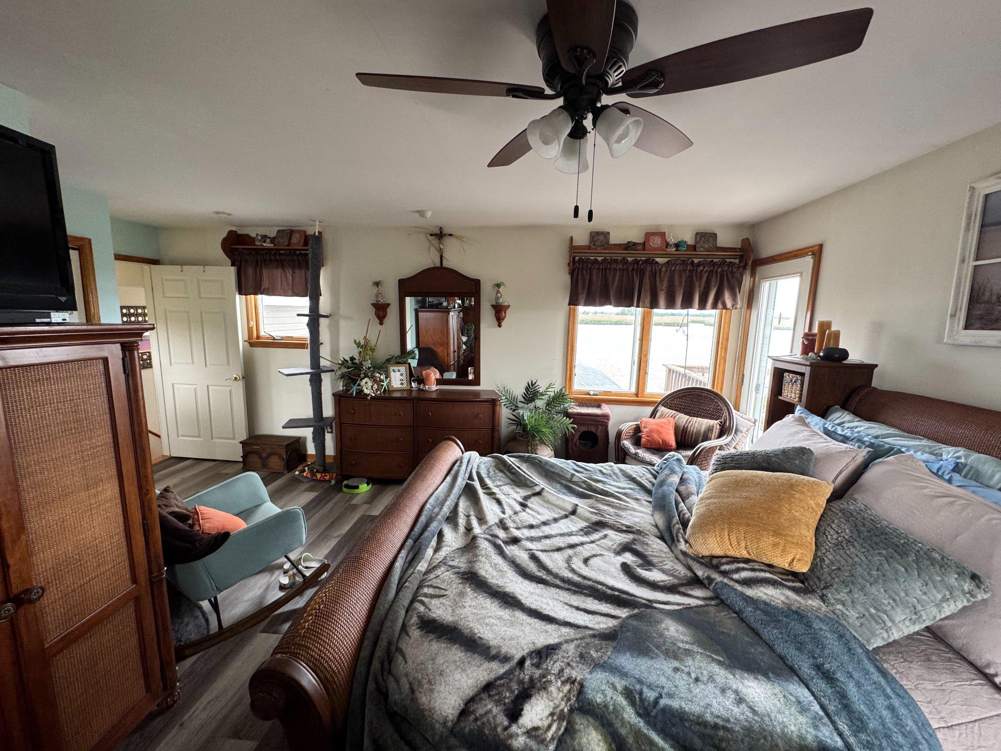 74 Sinnickson Landing Road Salem, NJ 08079 - Photo 30 of 51 a very nice looking bedroom with a large window and a wooden floor