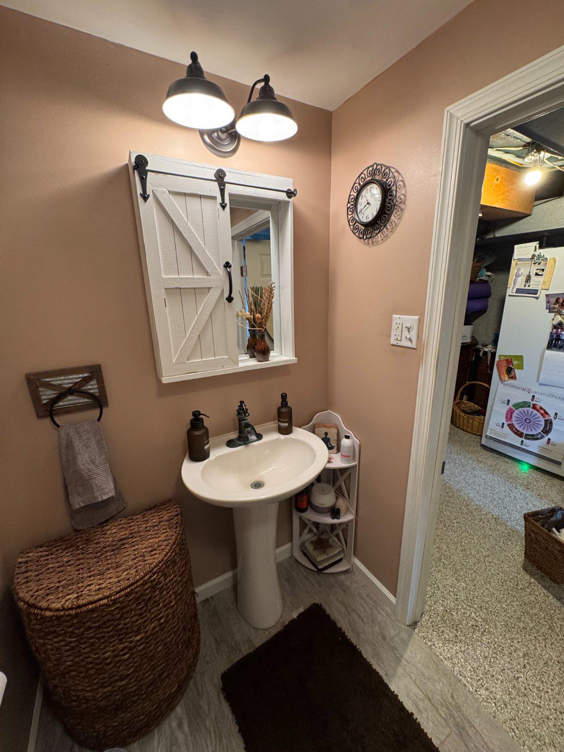 74 Sinnickson Landing Road Salem, NJ 08079 - Photo 42 of 51 a bathroom with a sink and a mirror