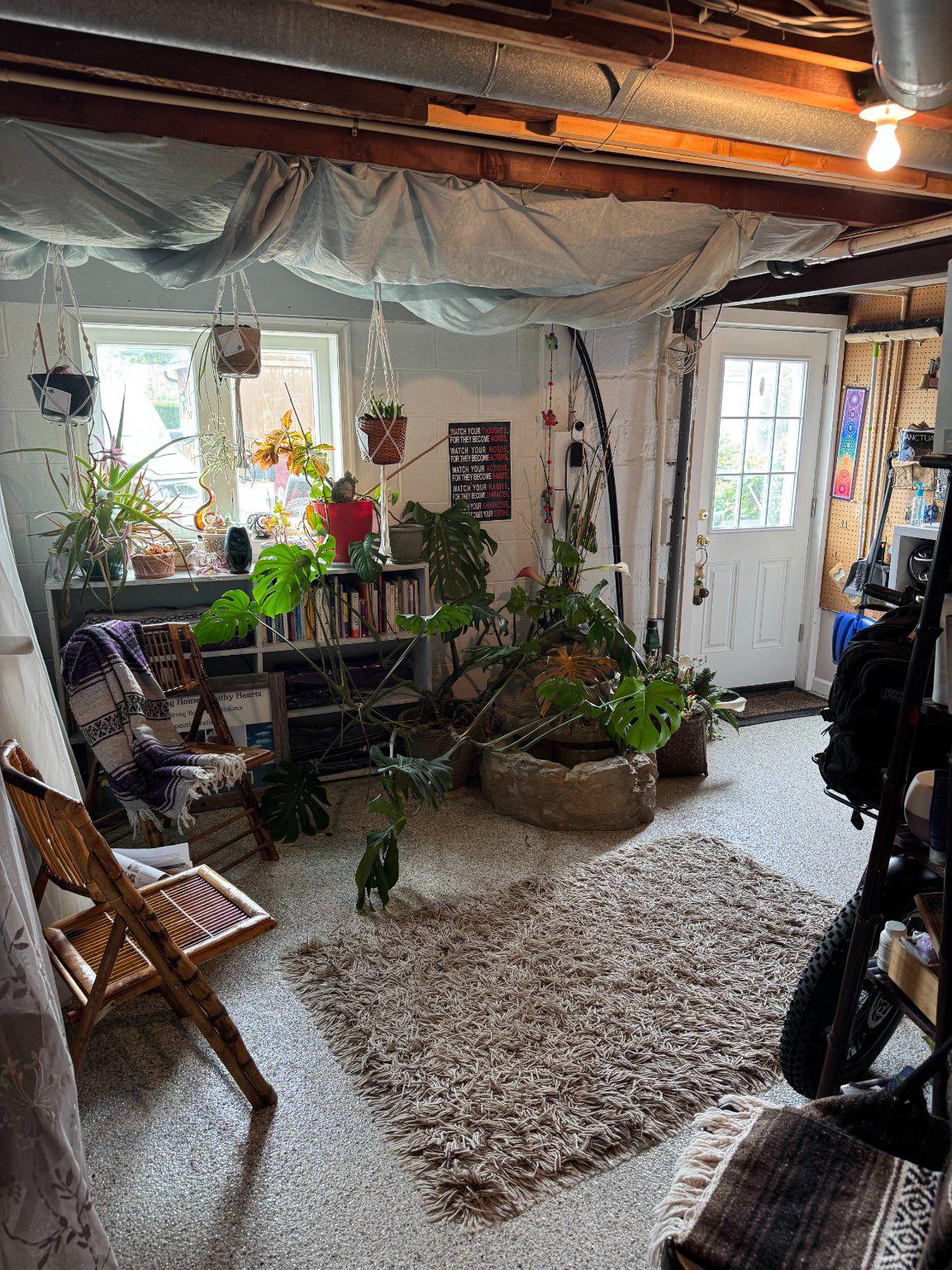 74 Sinnickson Landing Road Salem, NJ 08079 - Photo 43 of 51 a room with lots of potted plants and a dining table