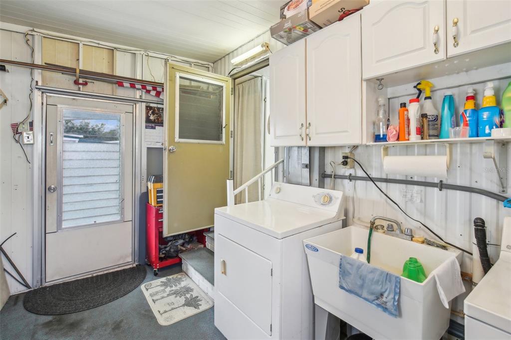 1600 Old Coachman Rd., Unit 311 Clearwater, FL 33765 - Photo 27 of 27 a utility room with dryer and washer