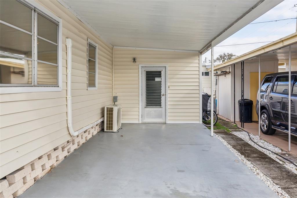 1600 Old Coachman Rd., Unit 311 Clearwater, FL 33765 - Photo 5 of 27 a view of a house with an outdoor space