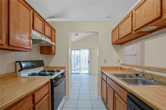 a utility room with cabinets