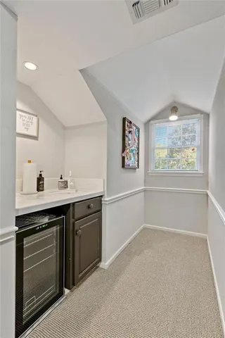 a kitchen with a stove and a sink