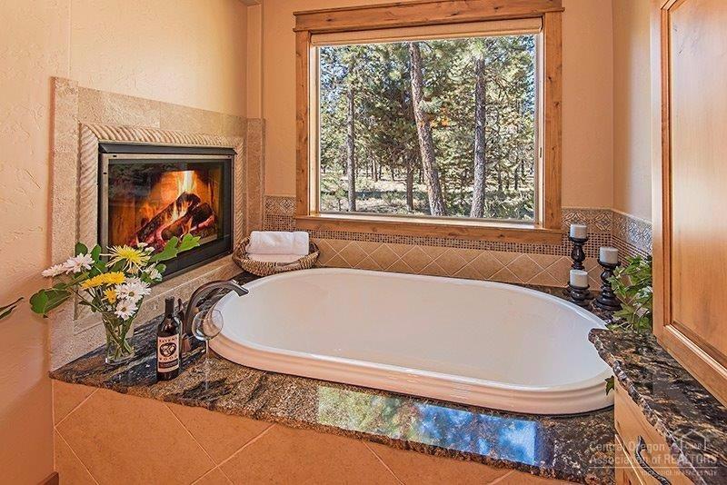 144 Sunstone Loop Bend, OR 97707 - Photo 13 of 24 This large soaking tub overlooking the s