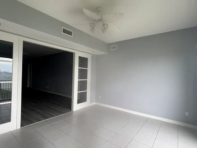 an empty room with windows