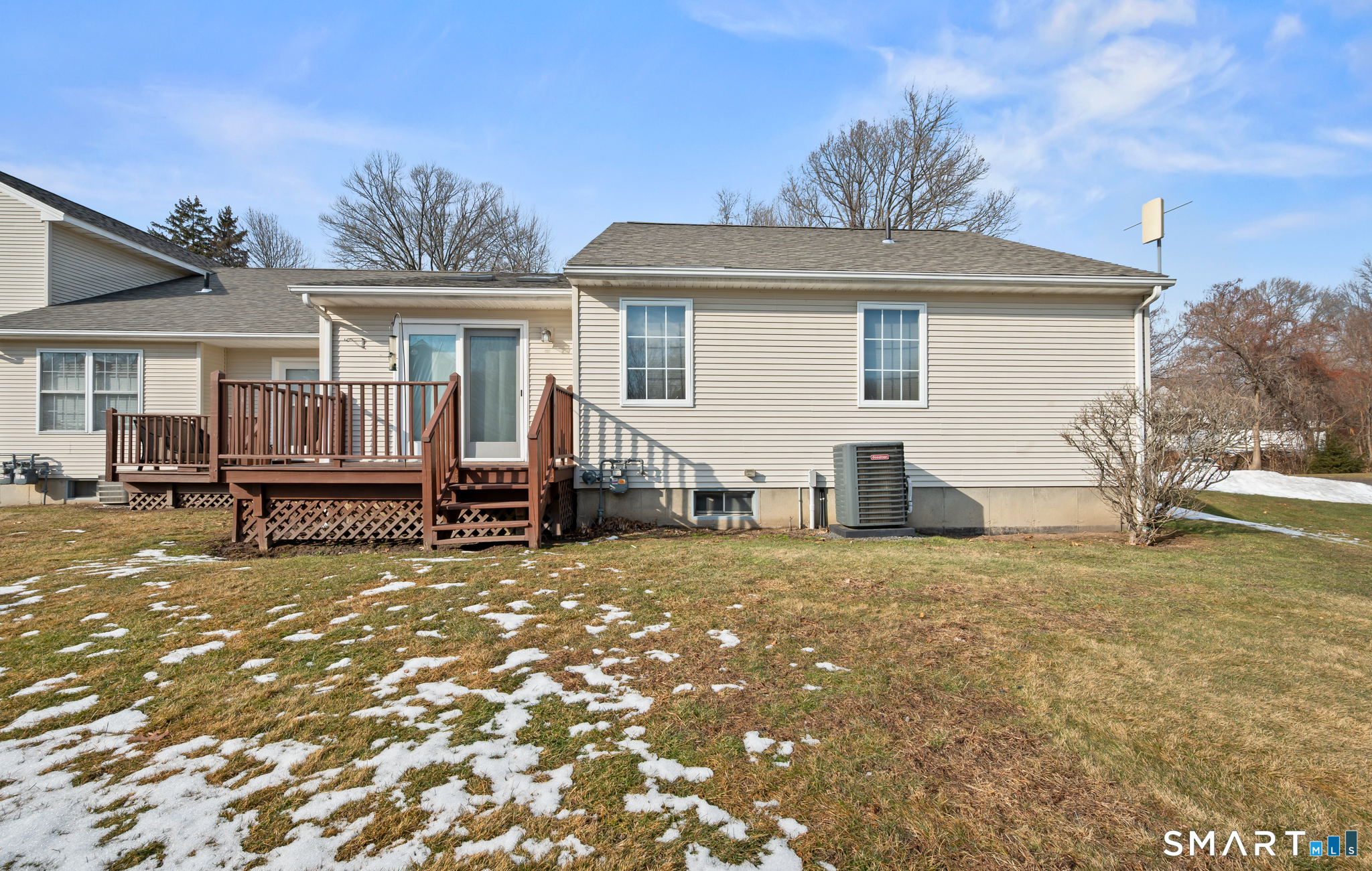 117 Dibble Hollow Lane, Unit 117 Windsor Locks, CT 06096 - Photo 29 of 34 a view of a house with wooden floor and a yard