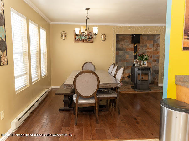 780 Cedar Court Rifle, CO 81650 - Photo 26 of 31 a view of a dining room with furniture window and outside view