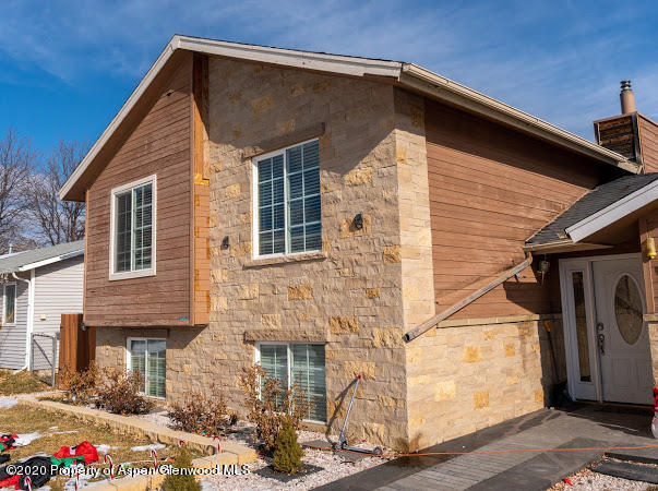 780 Cedar Court Rifle, CO 81650 - Photo 29 of 31 a view of a house with a street