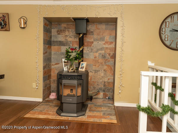 780 Cedar Court Rifle, CO 81650 - Photo 10 of 31 a living room with a wooden floor