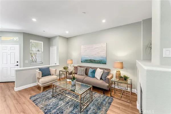 a living room with furniture and a couch