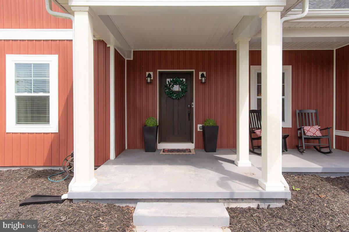 2390 Shirley Road Charles Town, WV 25414 - Photo 4 of 69 a view of a front door of a house
