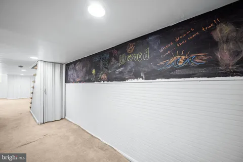 a bathroom with a toilet and a sink