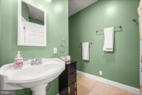 a view of a bedroom with washer and dryer