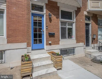 a view of cabinets and window