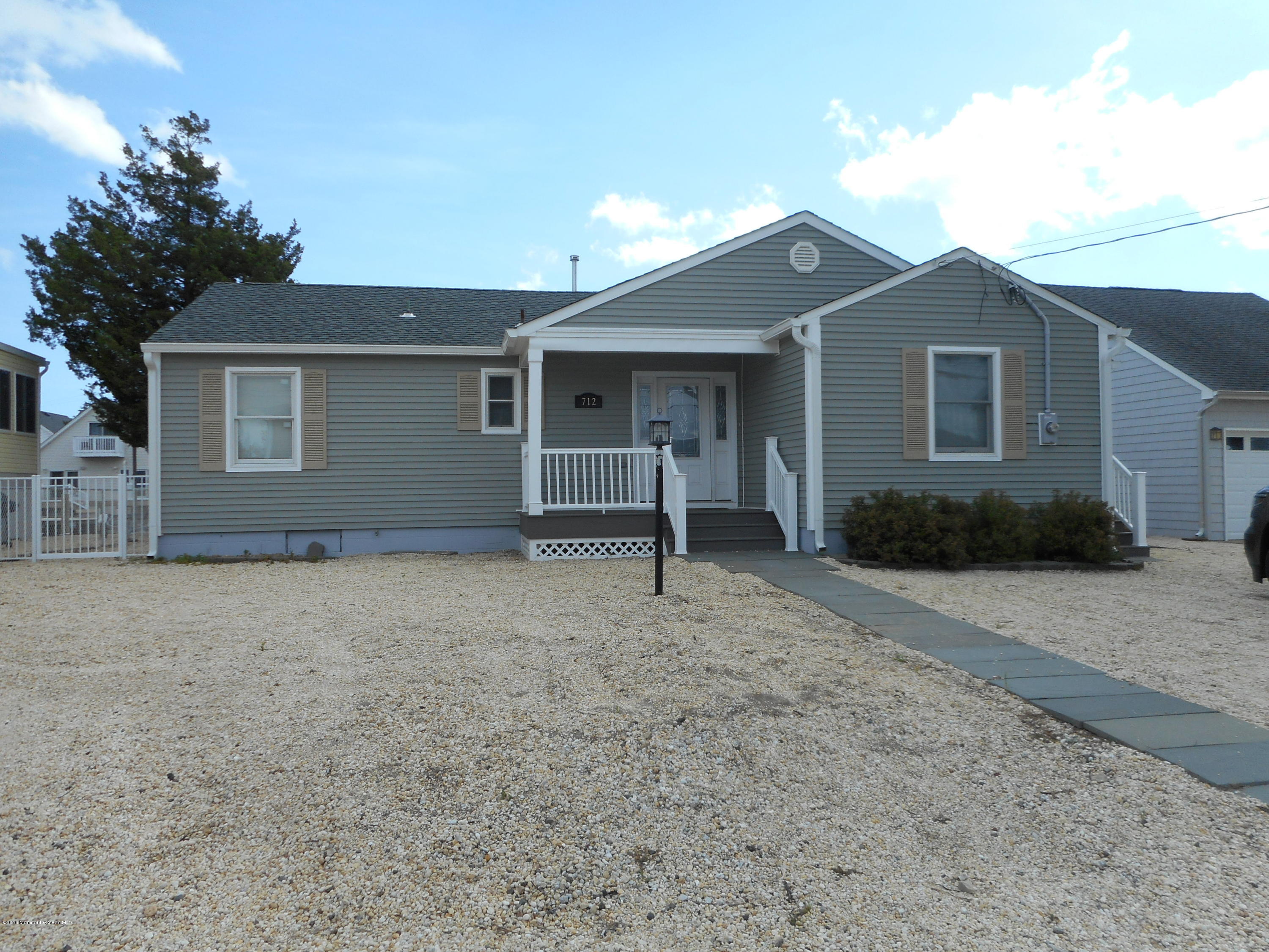 712 Drum Point Road Brick, NJ 08723 - Photo 23 of 23 a house view with a outdoor space