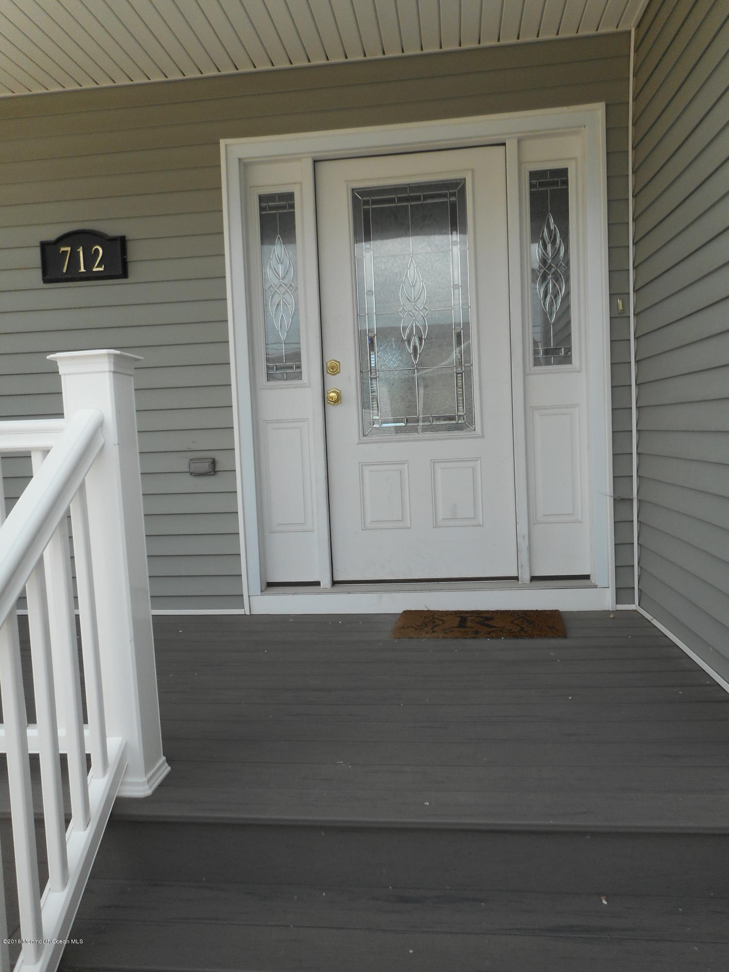 712 Drum Point Road Brick, NJ 08723 - Photo 4 of 23 a view of a door and a window