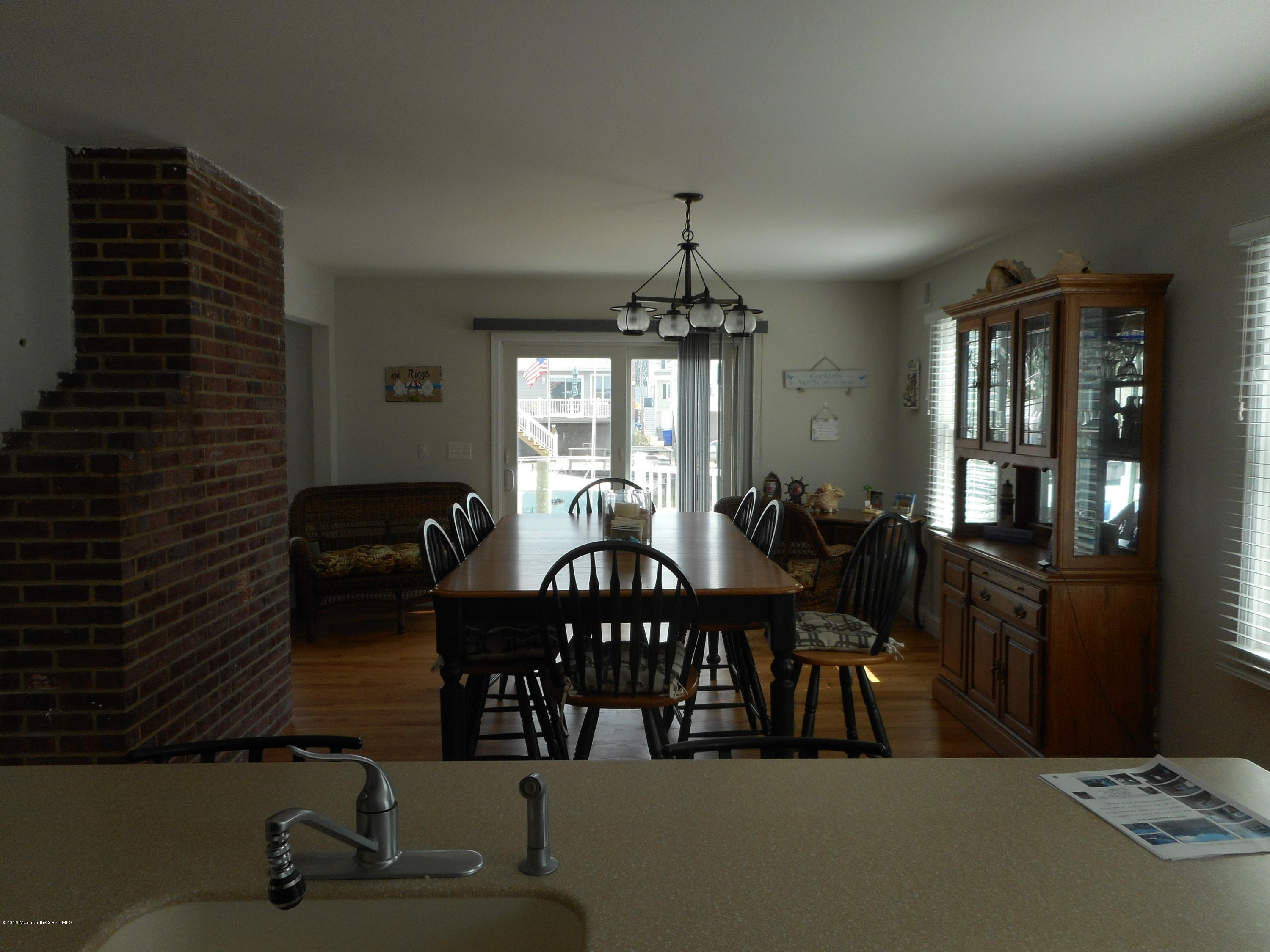 712 Drum Point Road Brick, NJ 08723 - Photo 9 of 23 a view of a dining room with furniture