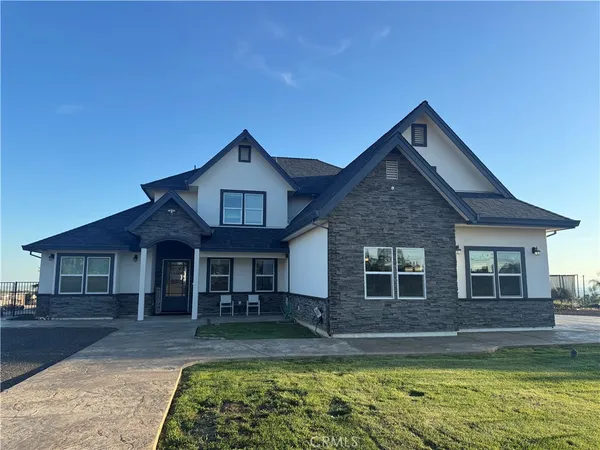 a view of a house with a swimming pool