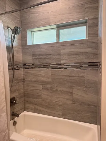 a view of a balcony with yard