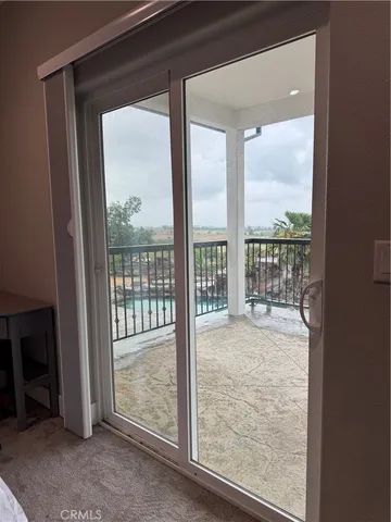 a view of a patio with chair and table