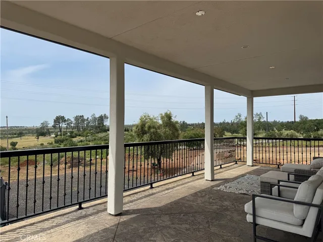 a wooden bench sitting in a yard