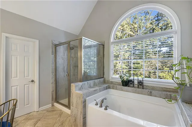 a bathroom with a sink vanity and a mirror