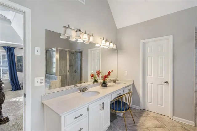 a bath tub sitting in a bathroom next to a window