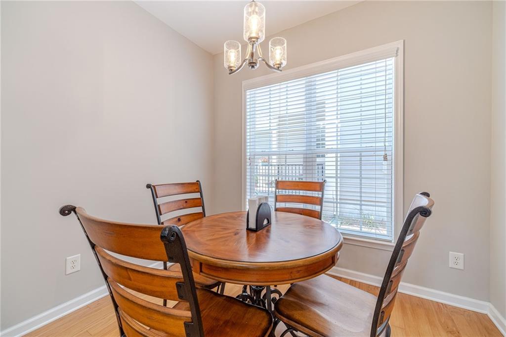 6260 Brookside Lane Hoschton, GA 30548 - Photo 37 of 59 a view of a dining room with furniture and window