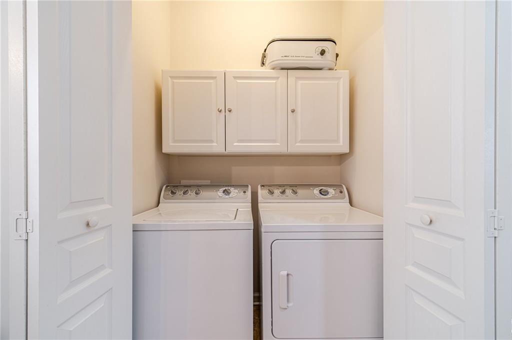 6260 Brookside Lane Hoschton, GA 30548 - Photo 39 of 59 a utility room with dryer and washer