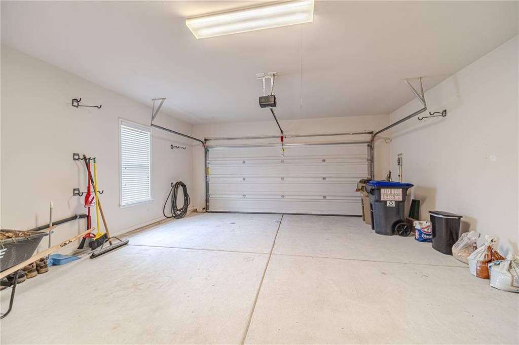 6260 Brookside Lane Hoschton, GA 30548 - Photo 45 of 59 a view of a garage with storage