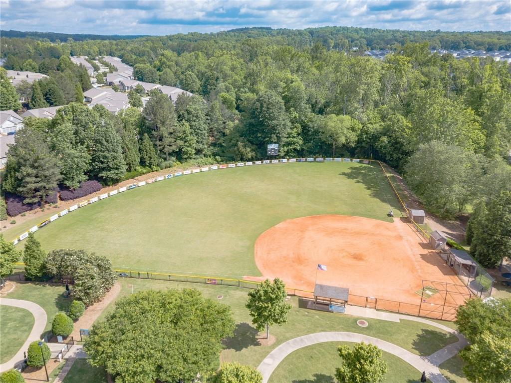6260 Brookside Lane Hoschton, GA 30548 - Photo 53 of 59 an aerial view of a house with a yard and lake view