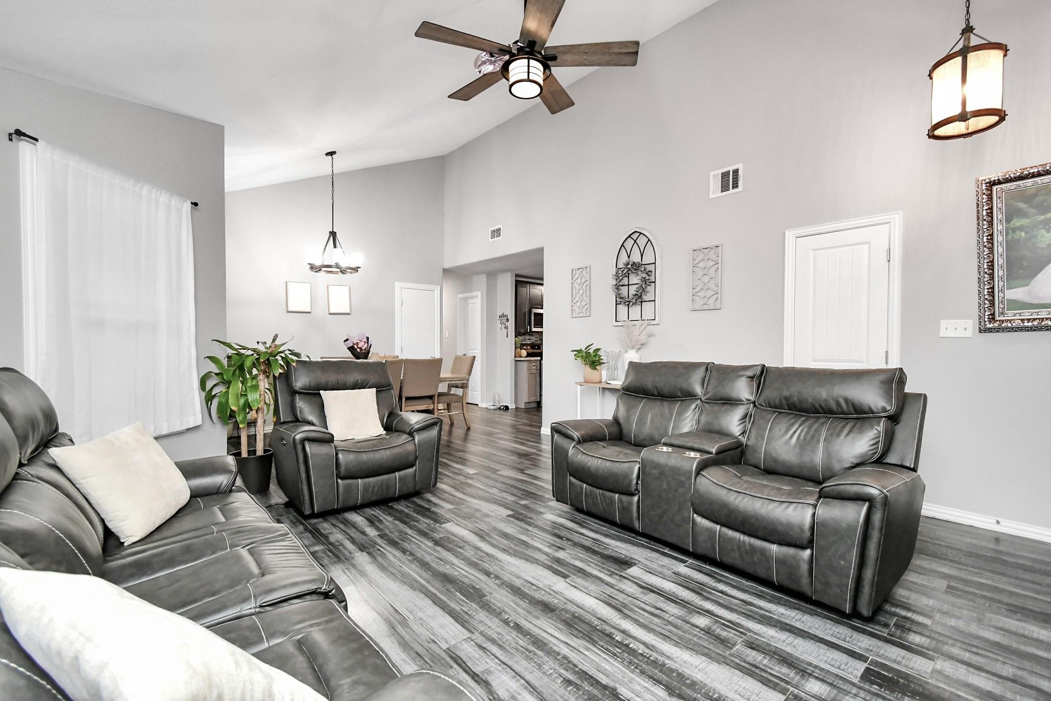23507 Tree House Lane Spring, TX 77373 - Photo 2 of 17 a living room with furniture and a rug