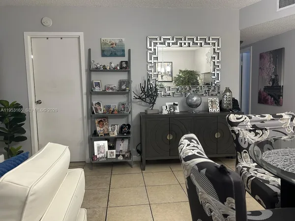 a view of a workspace with furniture