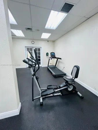 a view of a big yard with an outdoor space