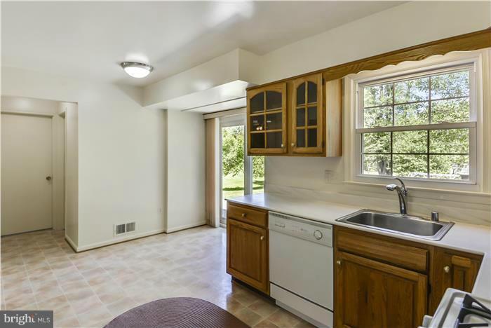 15507 Good Hope Road Silver Spring, MD 20905 - Photo 4 of 30 a kitchen with a sink and cabinets